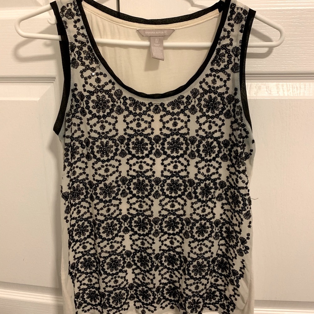 Gorgeous beaded black and white sleeveless top.